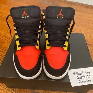 Jordan 1 Mid Black Amarillo Orange